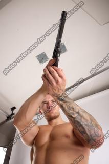 Piero Pose With Revolver